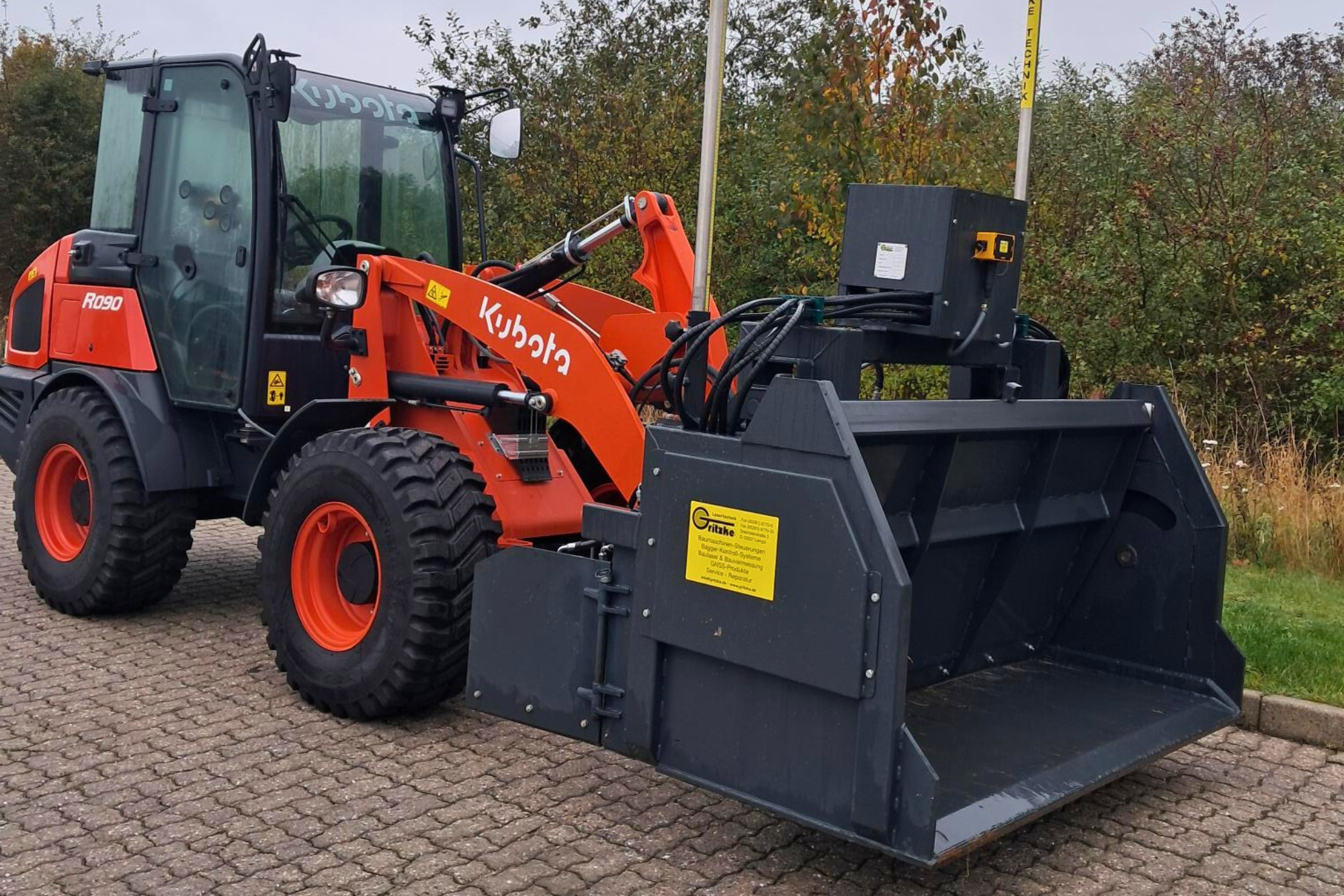 Kubota R090 Demo med Gritzke laserafretter